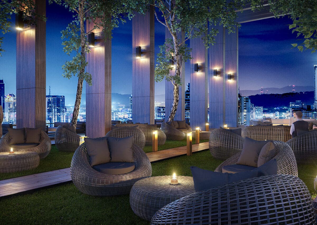 Greenwood Towers rooftop garden lounge at night