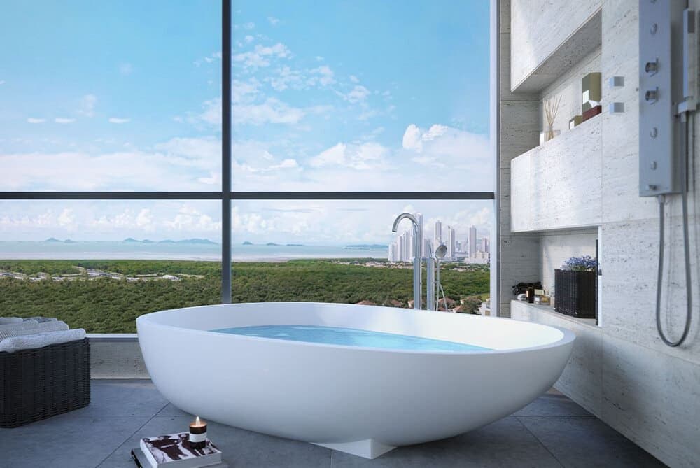 Freestanding bathtub facing panoramic views at Oceana Residences & Skyhomes