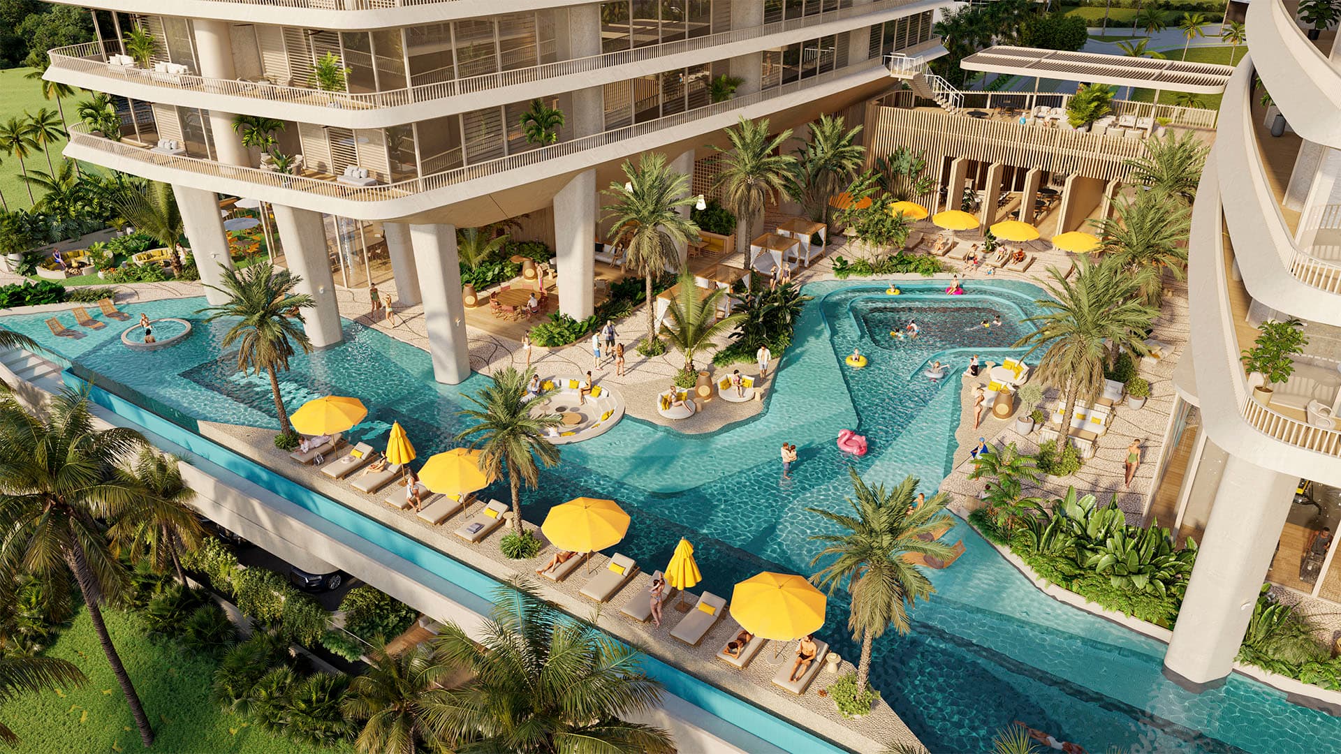 Aerial view of the Ipanema lagoon pool with sun loungers and yellow umbrellas