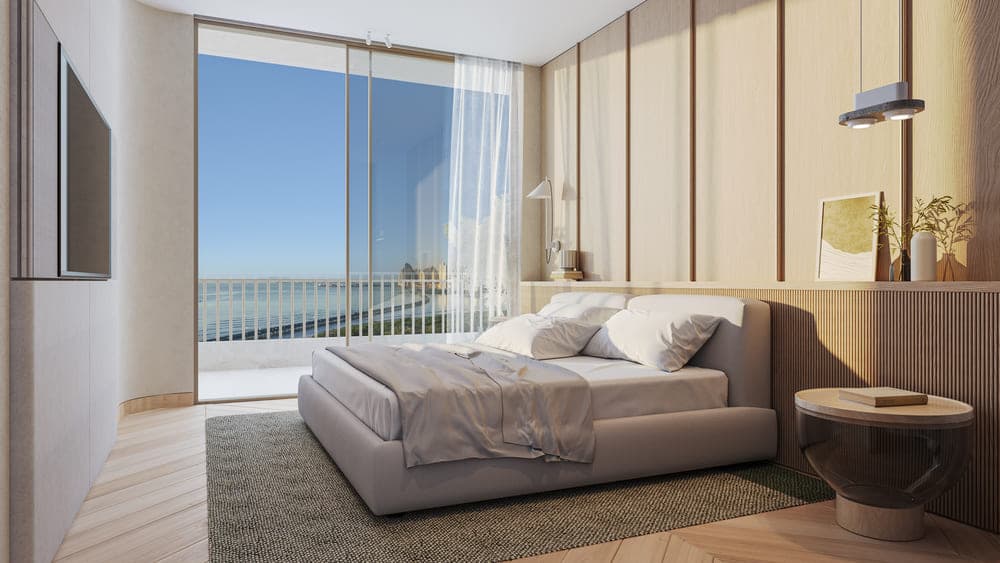 Bedroom with floor-to-ceiling window in an Ipanema apartment