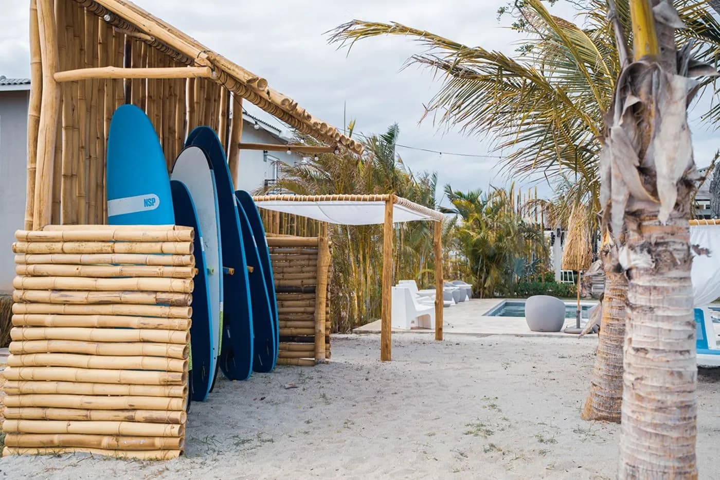 Surfboard rack at The Tides surf club on Playa Caracol
