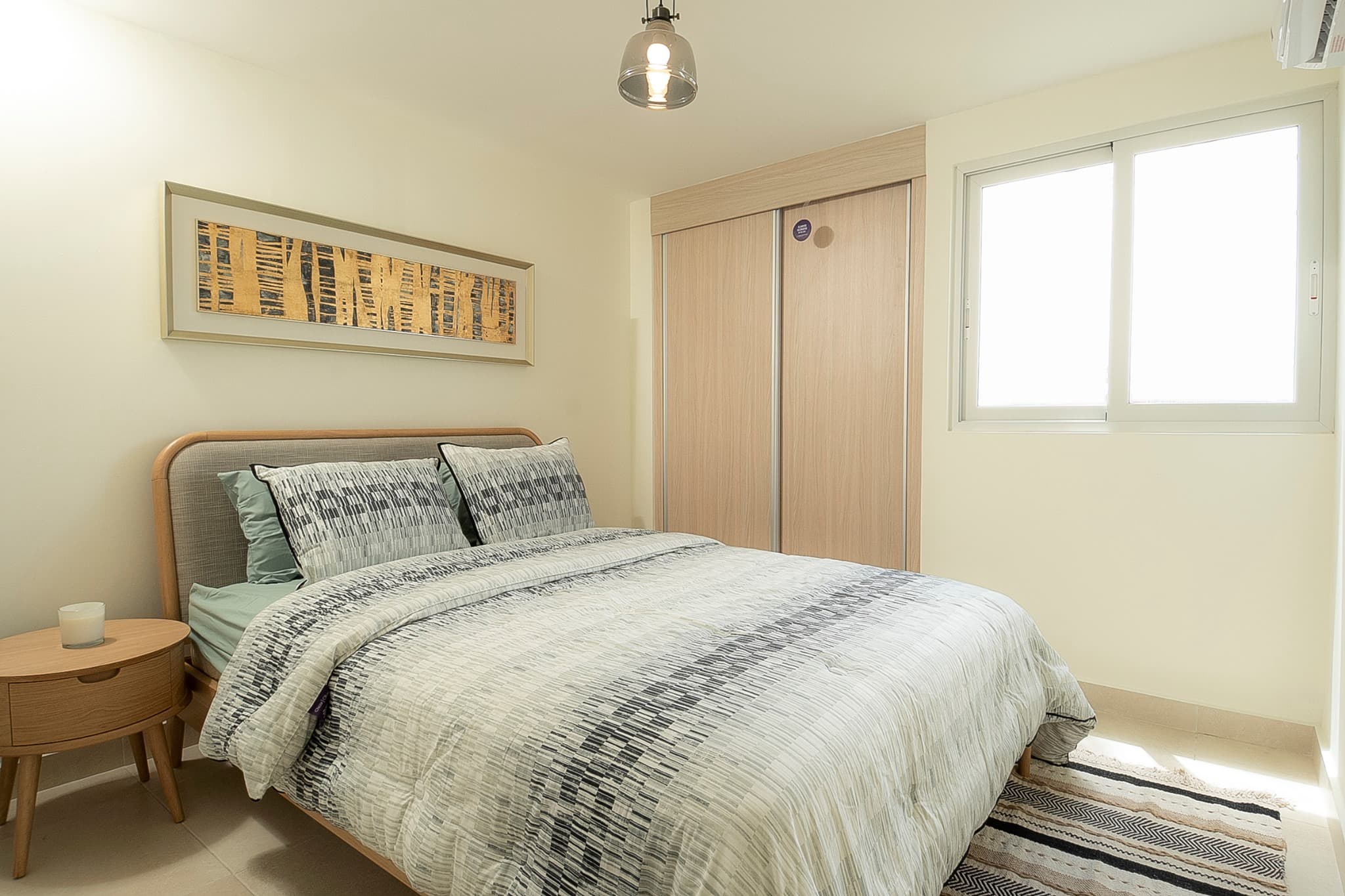Bedroom with built-in wardrobe in a Panama Viejo Residences apartment