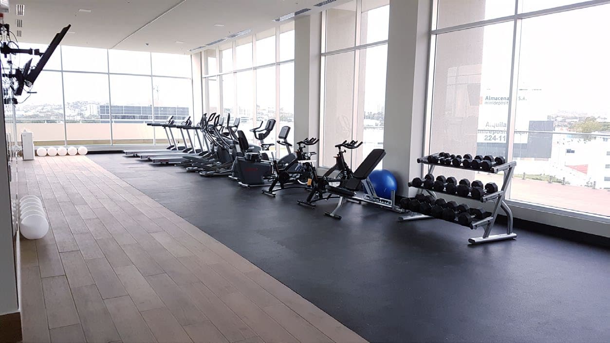 Fitness center at Bali with cardio machines and free weights