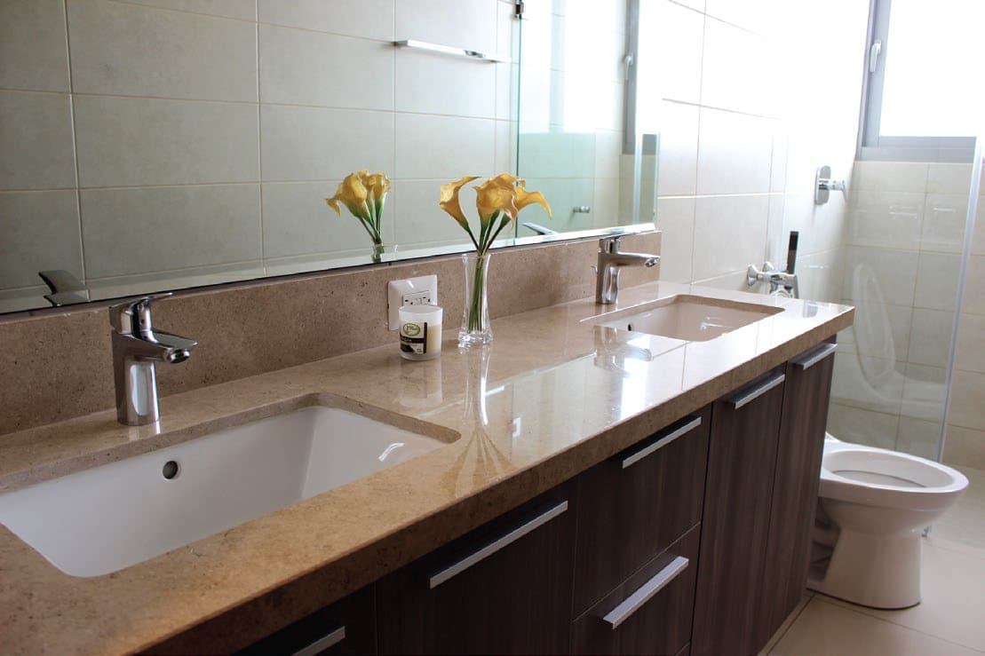 Bathroom with double vanity in an apartment at Bali