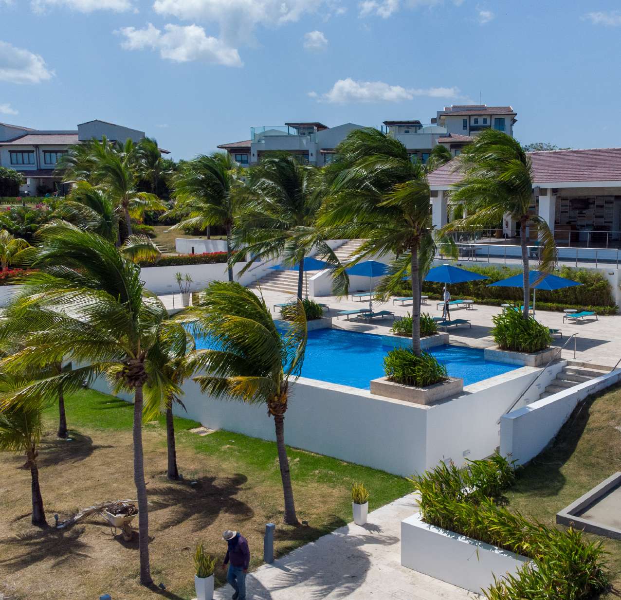 Aerial view of the cascading pools and gardens at the Casamar community, home of Ocean Villas