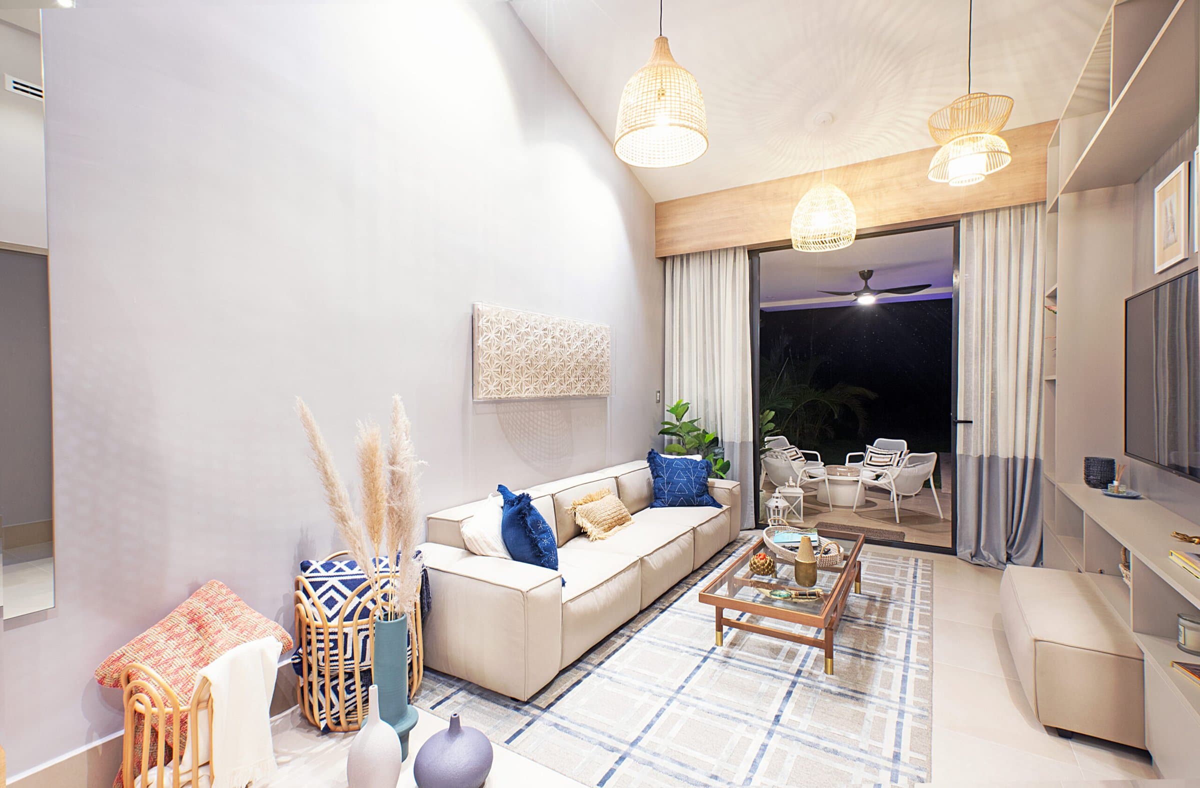 Double-height living room at Ocean Villas opening onto the terrace