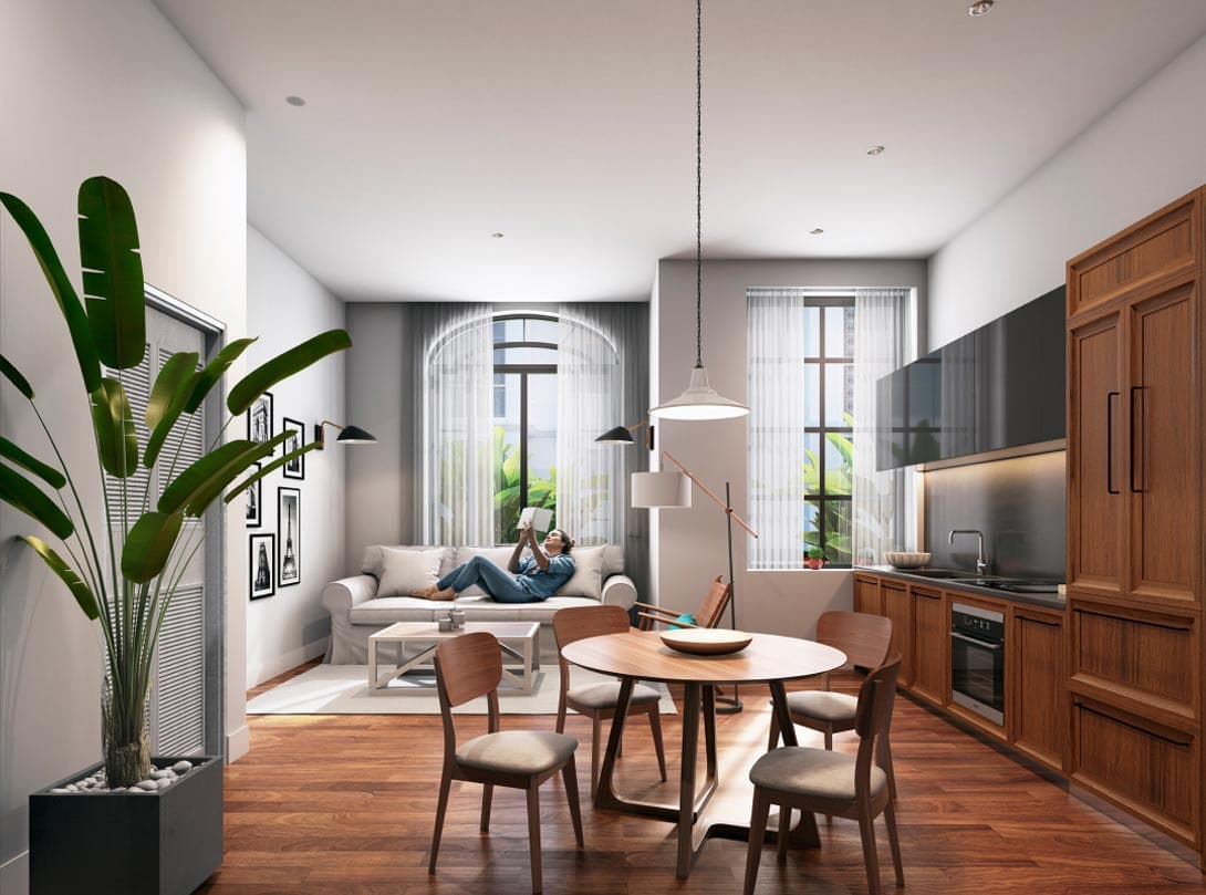 Kitchen and dining nook with wood cabinetry in a Santa Familia apartment