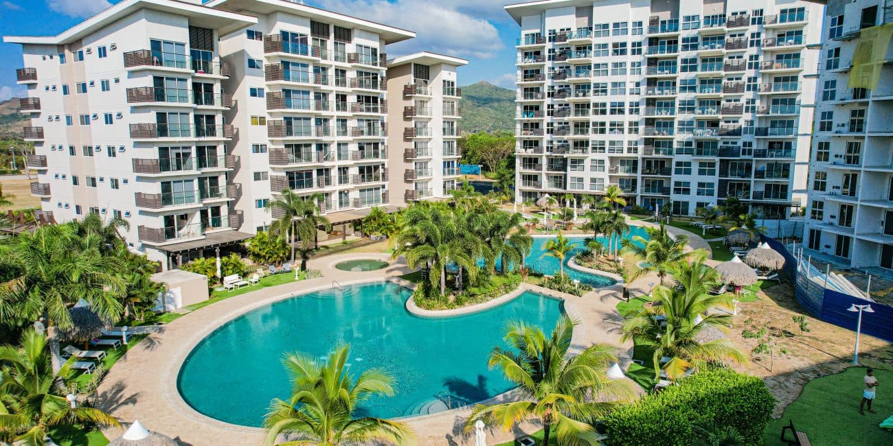 Playa Caracol apartment towers around a landscaped pool