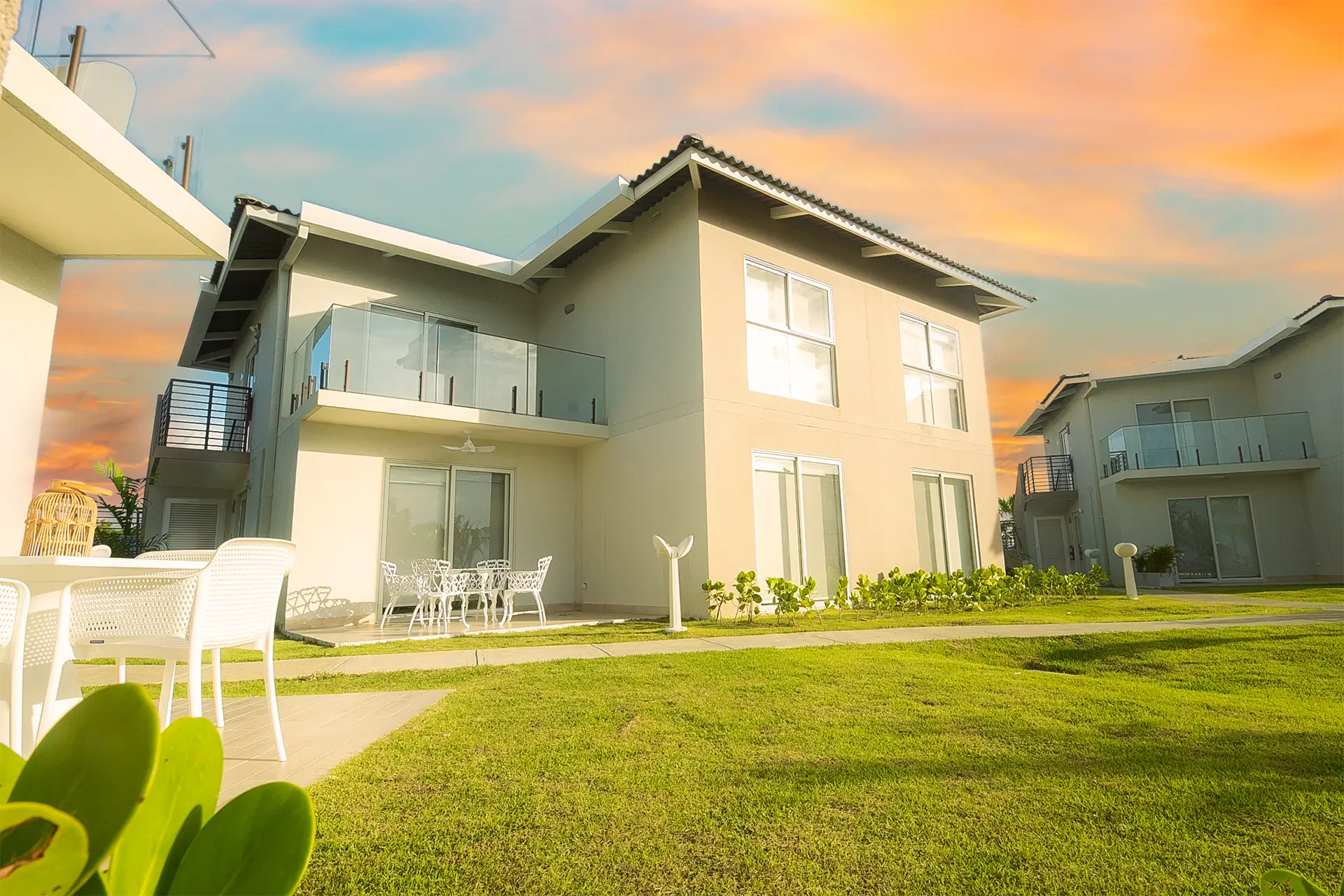 Two-story villa with garden at Playa Caracol at sunset