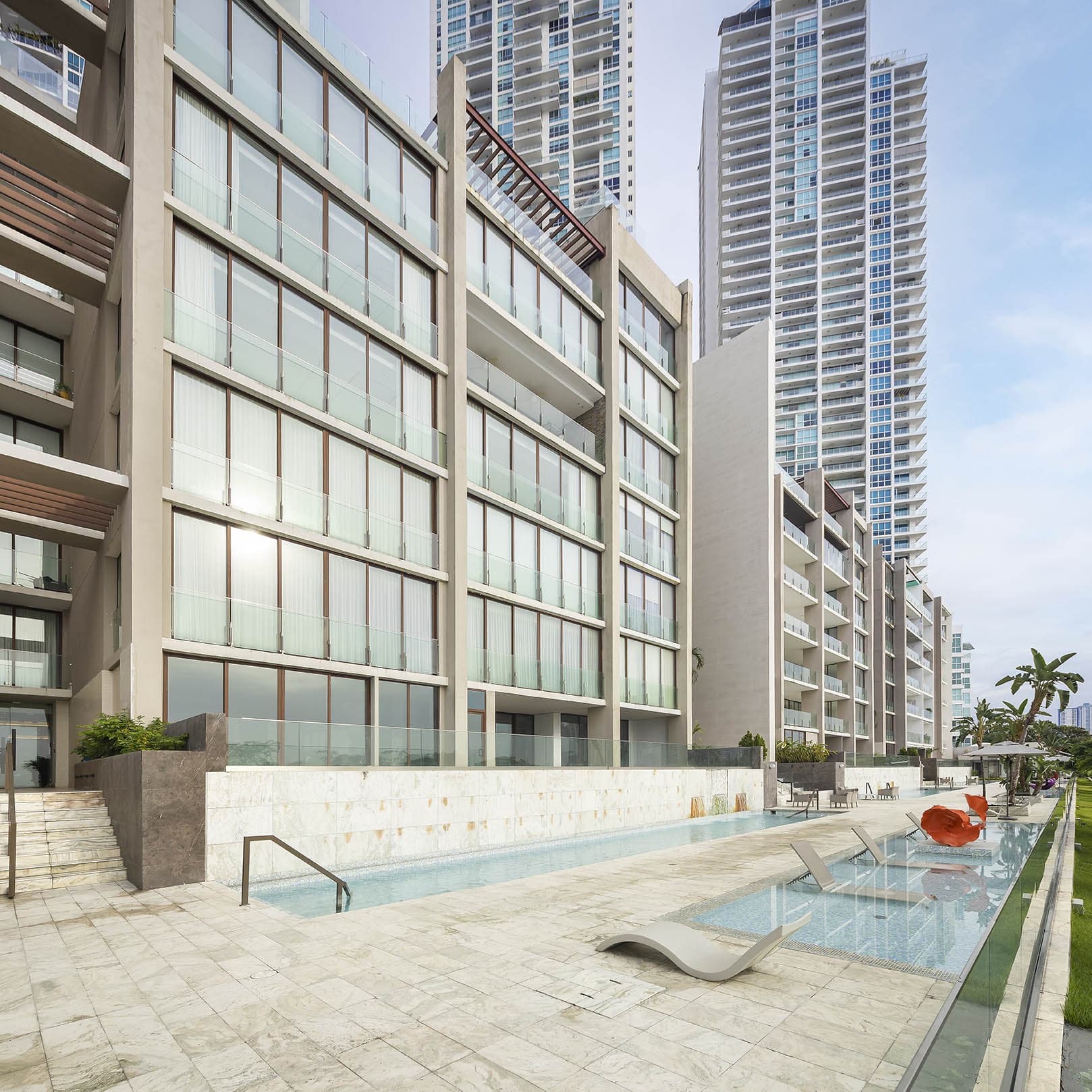 The Residences building facade above its pool terrace, Panama City