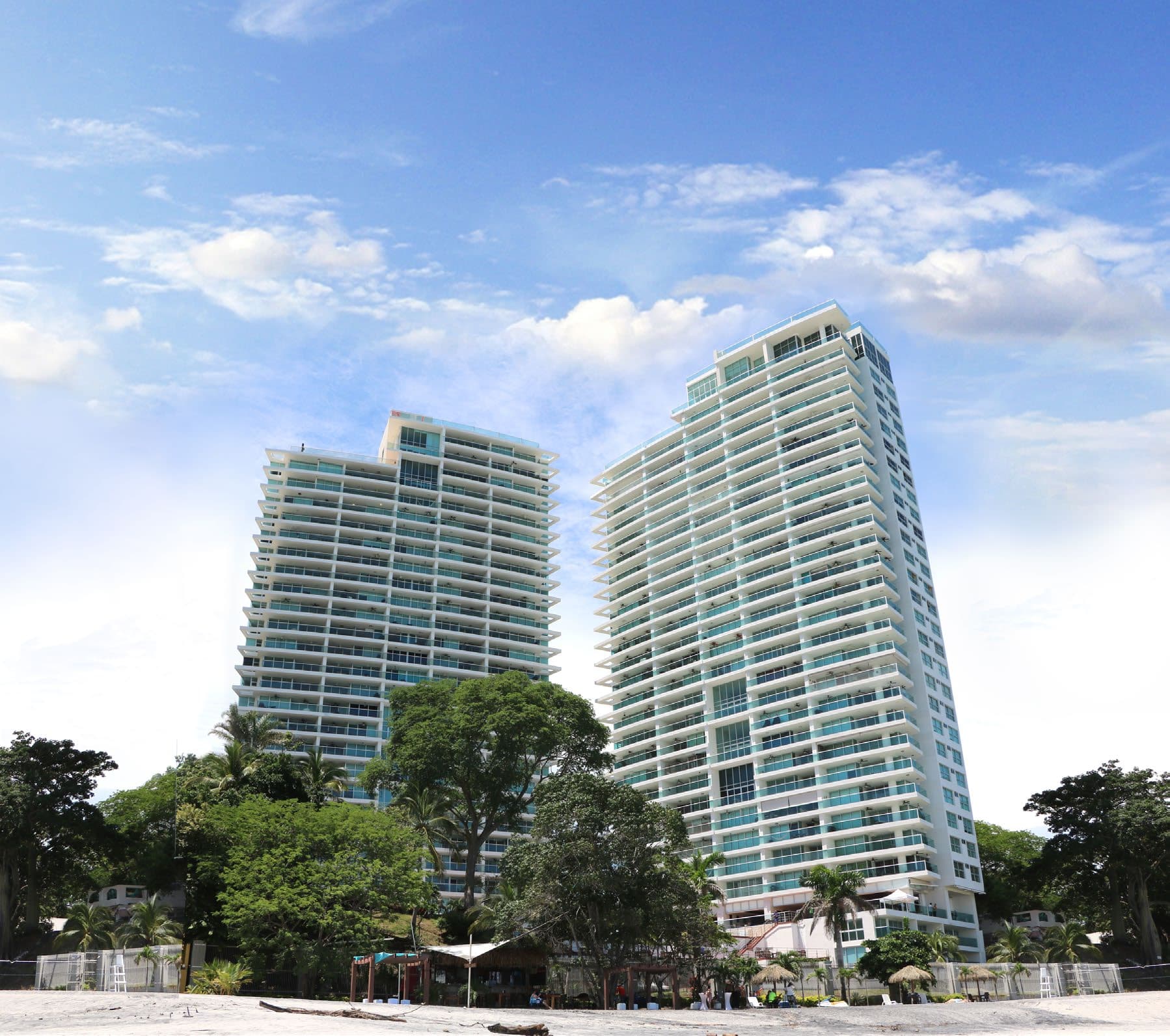 The two Bahia apartment towers rising above the trees at Playa Serena, Nueva Gorgona