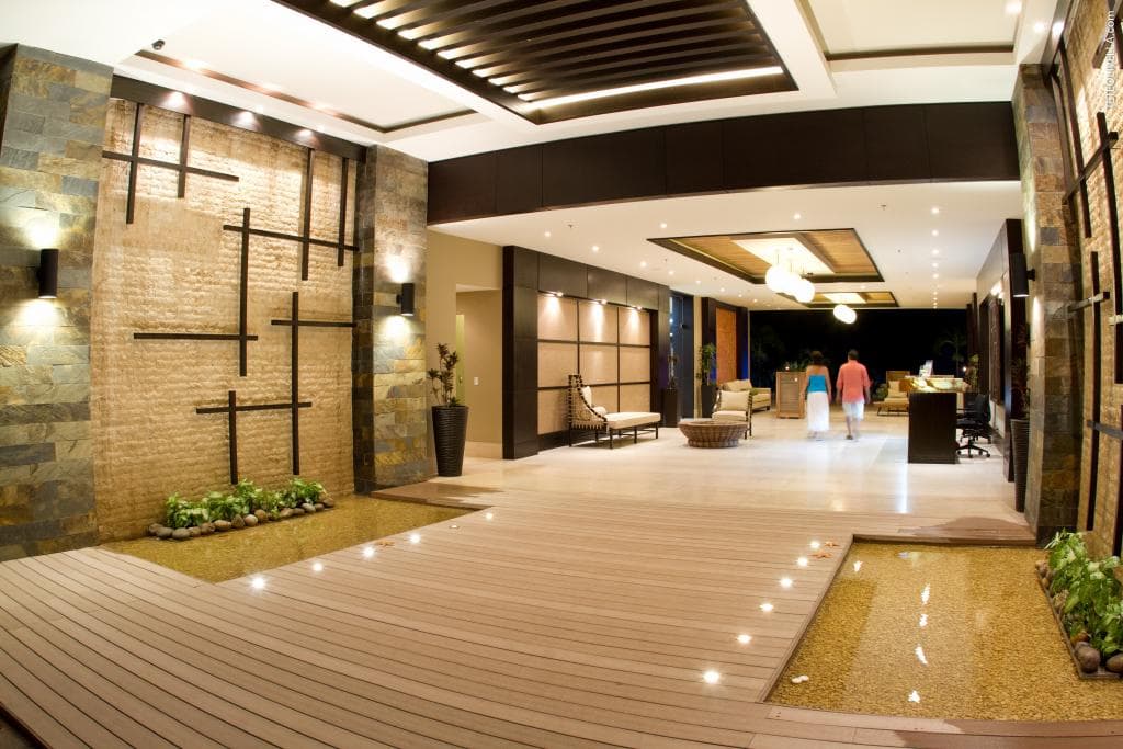 Lobby entrance of the Bahia towers with stone walls and wood ceiling