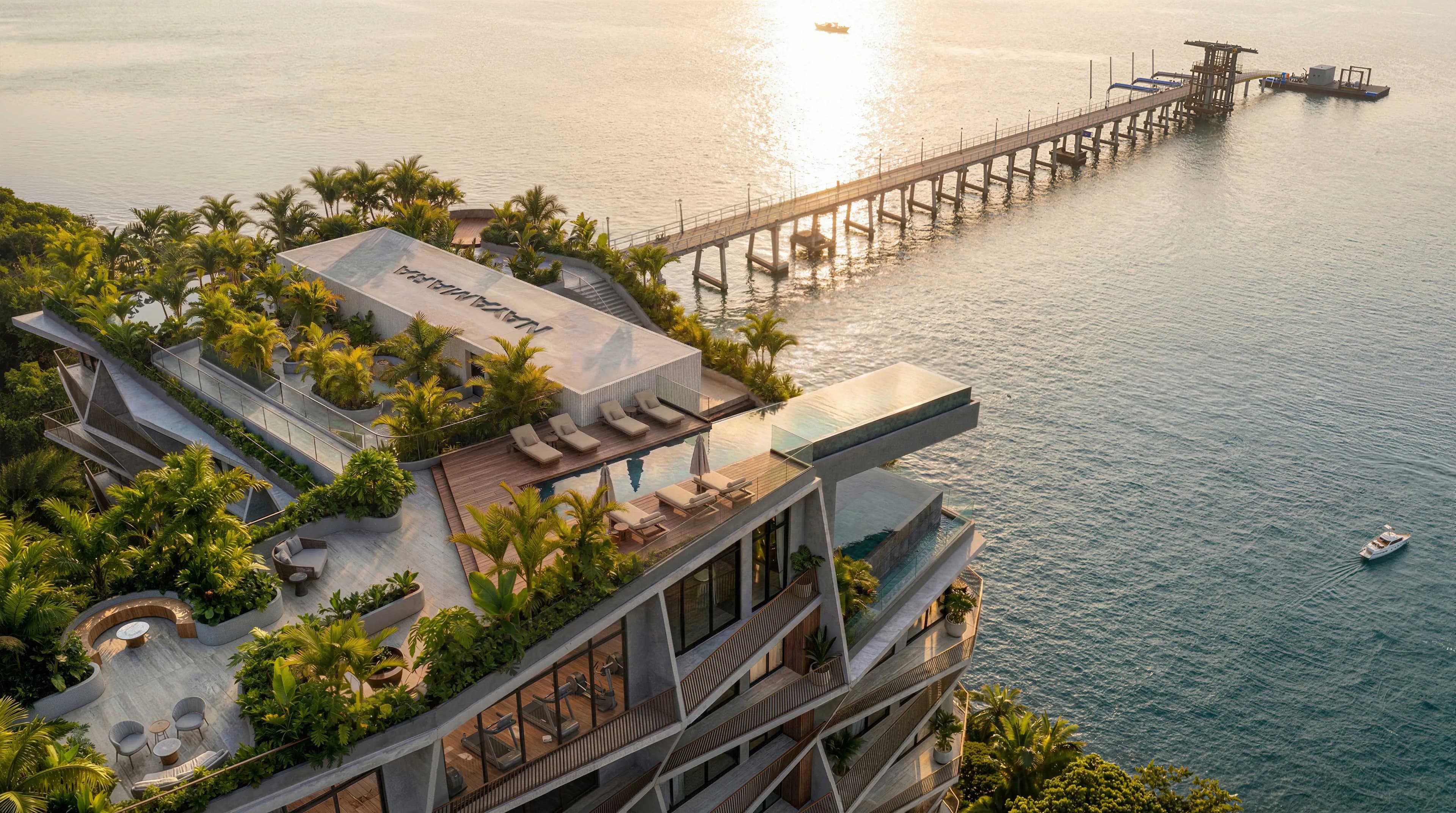 Aerial view of the Nayamara rooftop amenities over the bay and pier