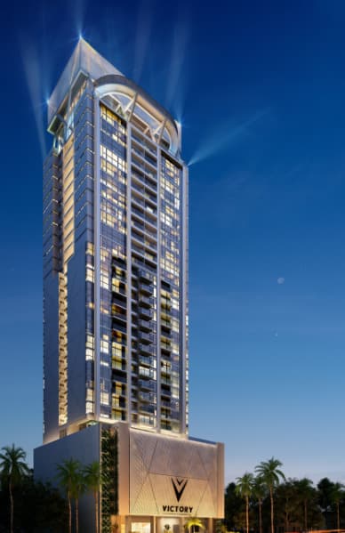Victory Sport tower facade in Coco del Mar, Panama City, at night