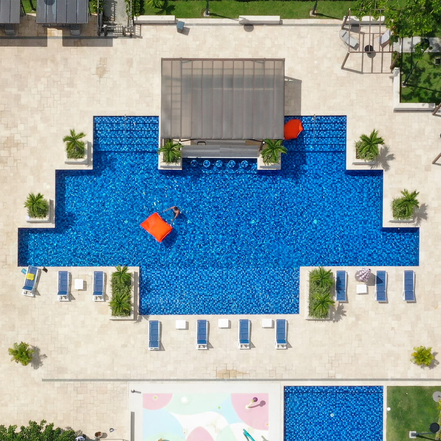 Aerial view of the Parterre swimming pool and sun loungers