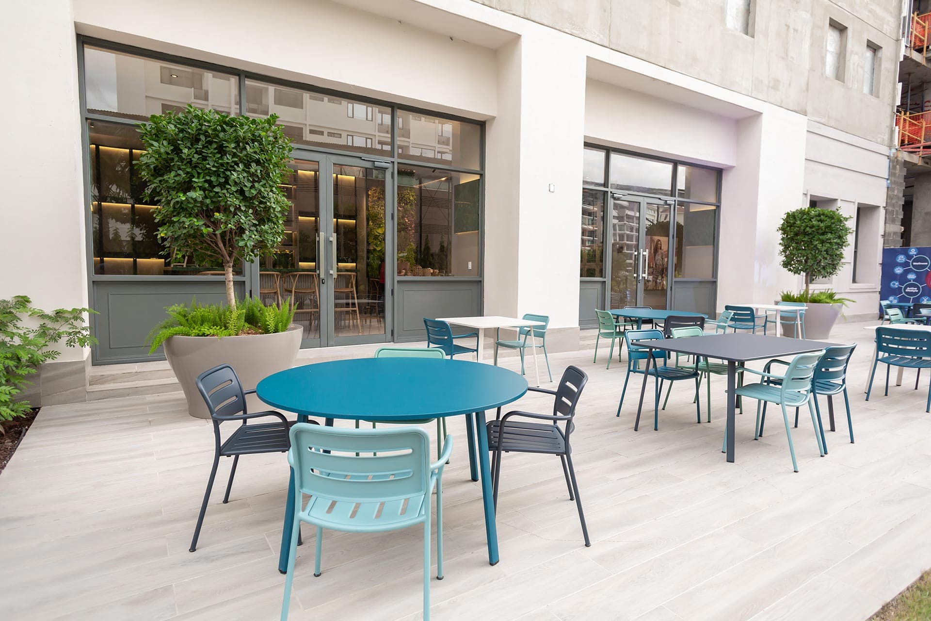 Outdoor terrace with bistro tables at Ocean House, Santa Maria