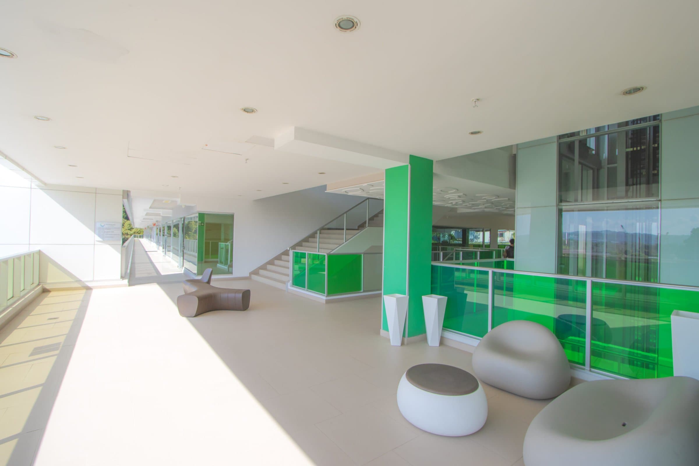Open-air corridor and seating area at Terrazas de Albrook