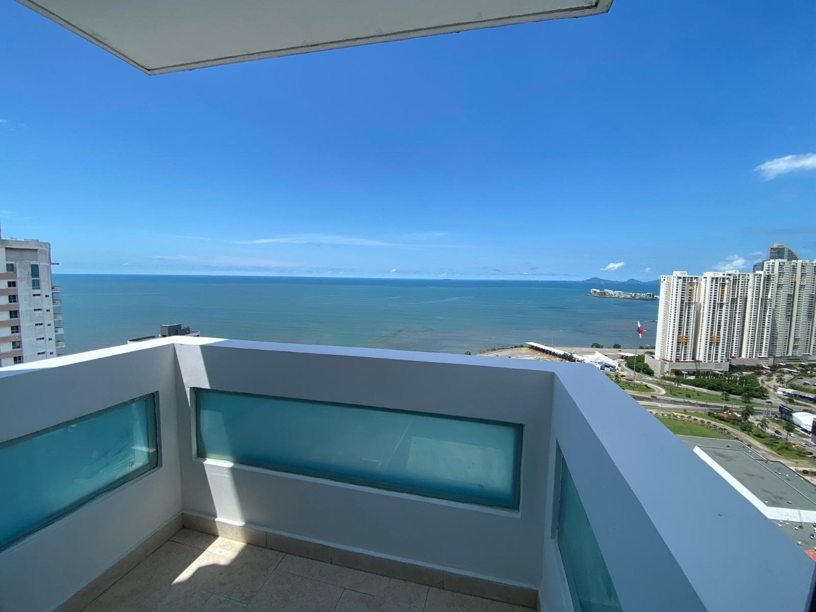Ocean and coastline view from a high balcony at PH The View, San Francisco, Panama City