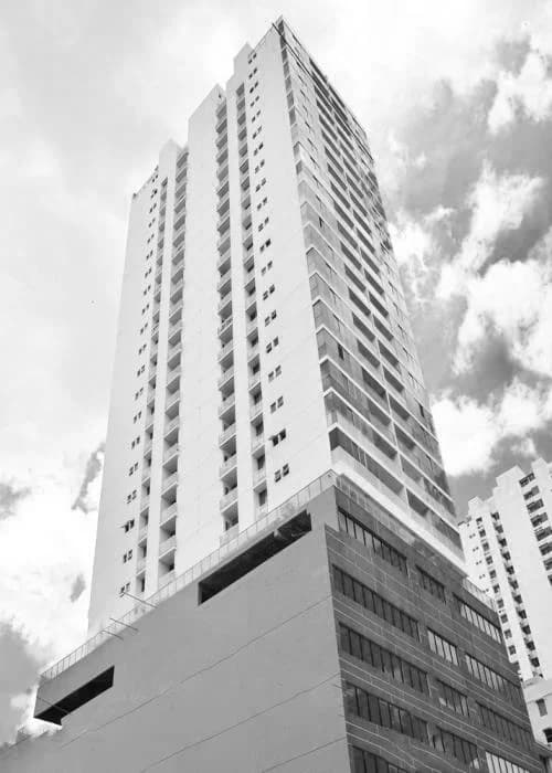 Black-and-white upward view of the Pacific Sea residential tower, Punta Paitilla, Panama City
