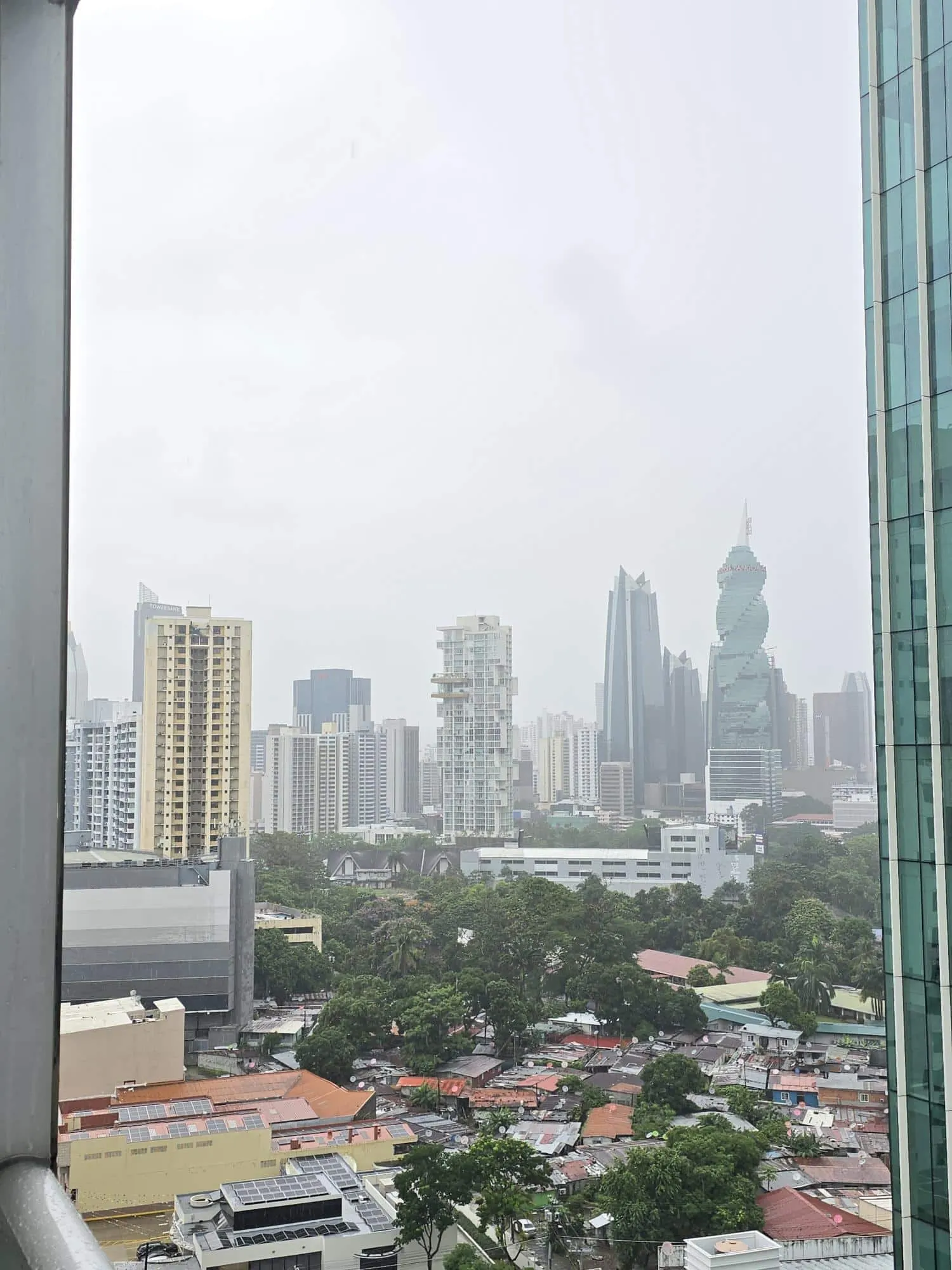 City skyline view from a window in the Pacific Sea tower, Punta Paitilla, Panama City