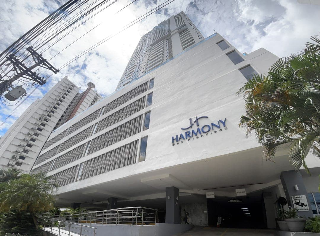 Harmony Tower residential high-rise rising above its white podium with the Harmony San Francisco sign, San Francisco, Panama City