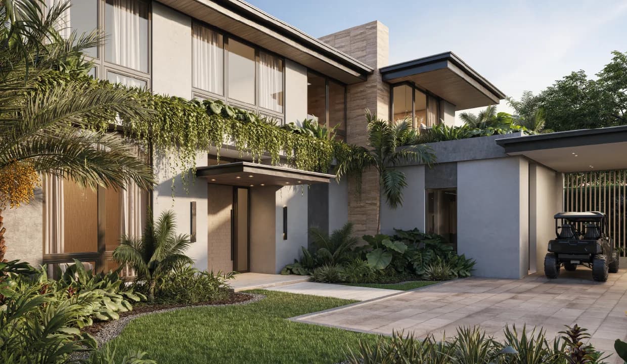Side view of a Luxury Residences Península house with garage and landscaped lawn