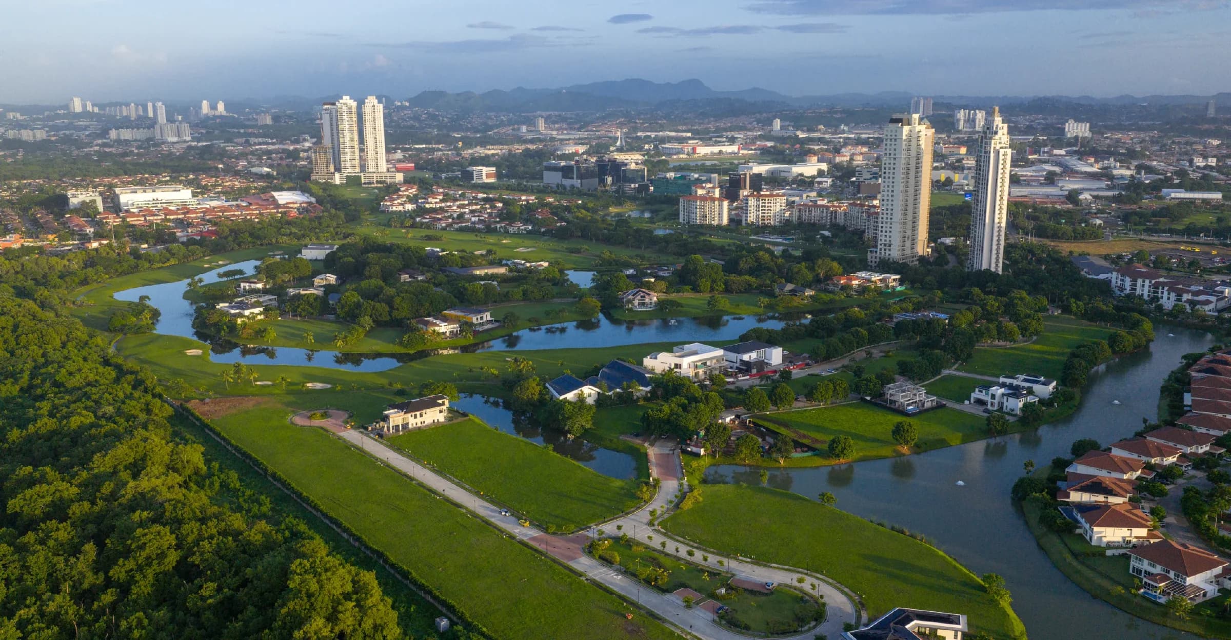 Aerial view of Santa Maria Golf & Country Club with the Panama City skyline