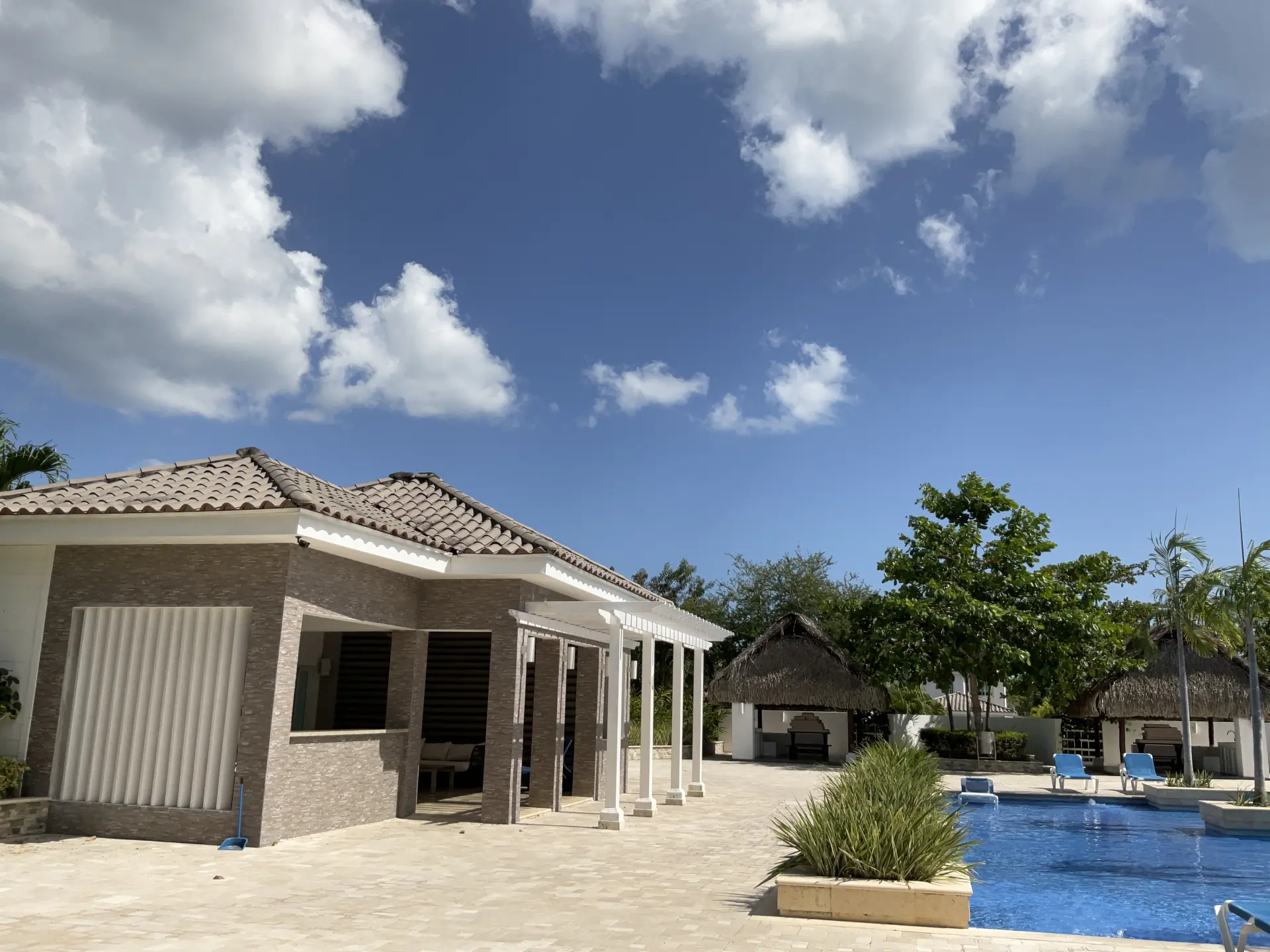 Pool and clubhouse at Bijao Beach Club & Residences near Veranera