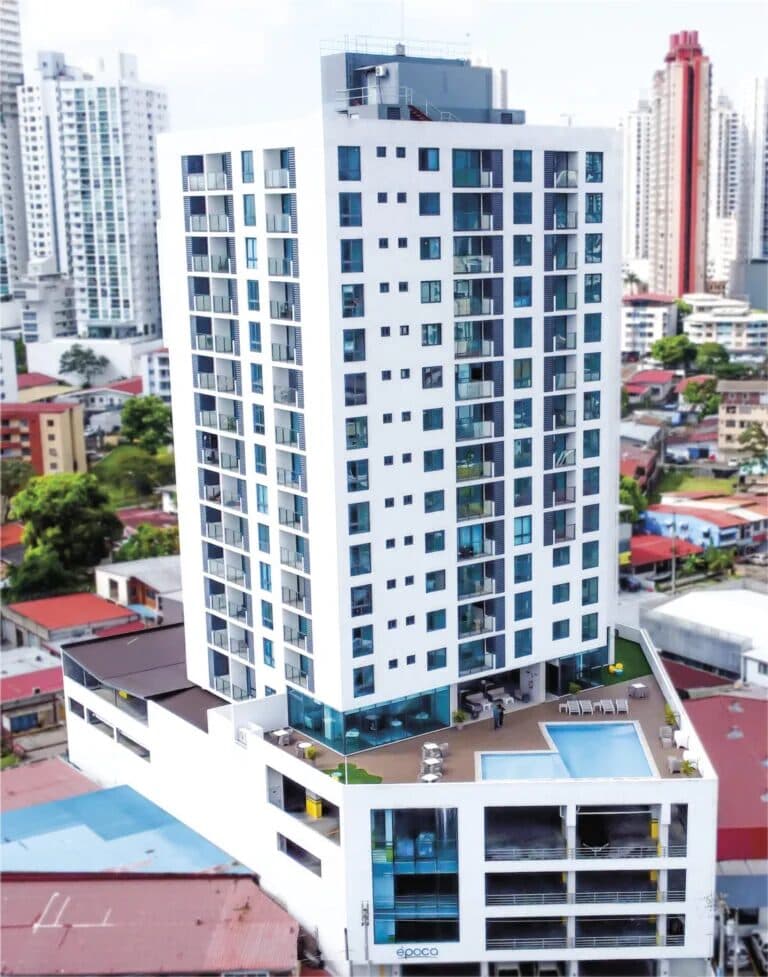Época Parque Lefevre white residential tower rising above Parque Lefevre, Panama City