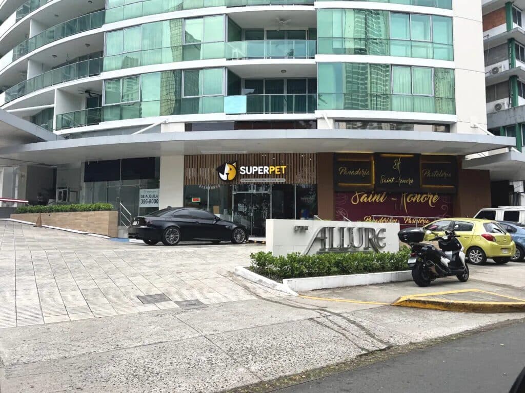 Street-level entrance and retail frontage of Allure at the Park
