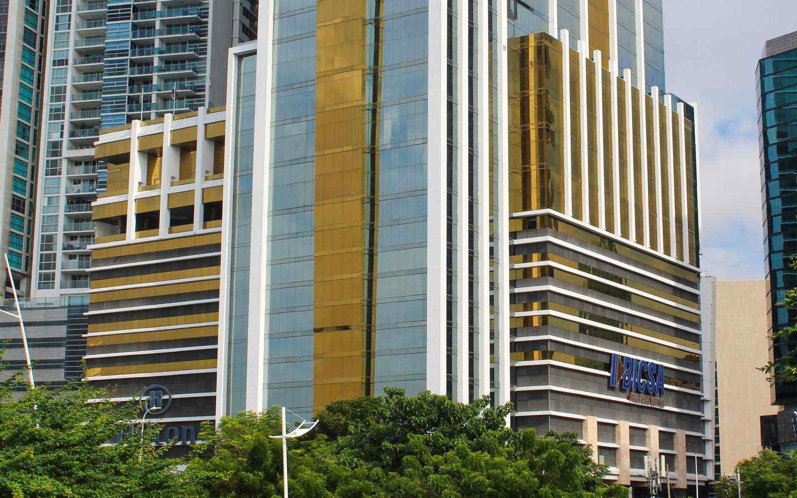 BICSA Financial Center podium with gold vertical fins and the BICSA sign, Avenida Balboa