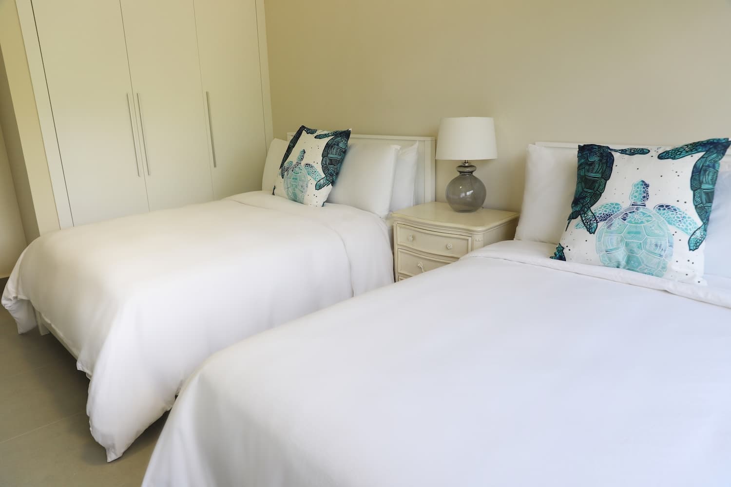 Twin bedroom with built-in wardrobe in a Villa Marina condo