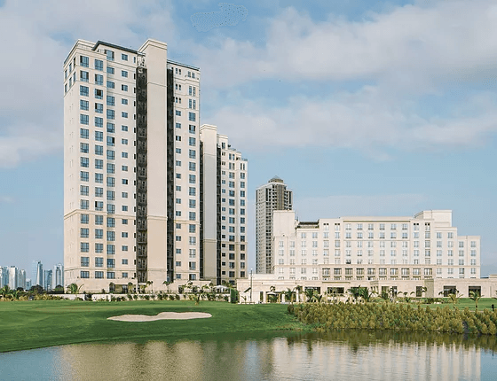Santa María Court towers beside The Santa Maria hotel and the golf course lake
