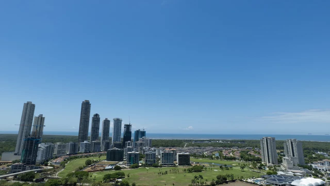 Aerial view from the Capela site over the Santa Maria golf course toward the city