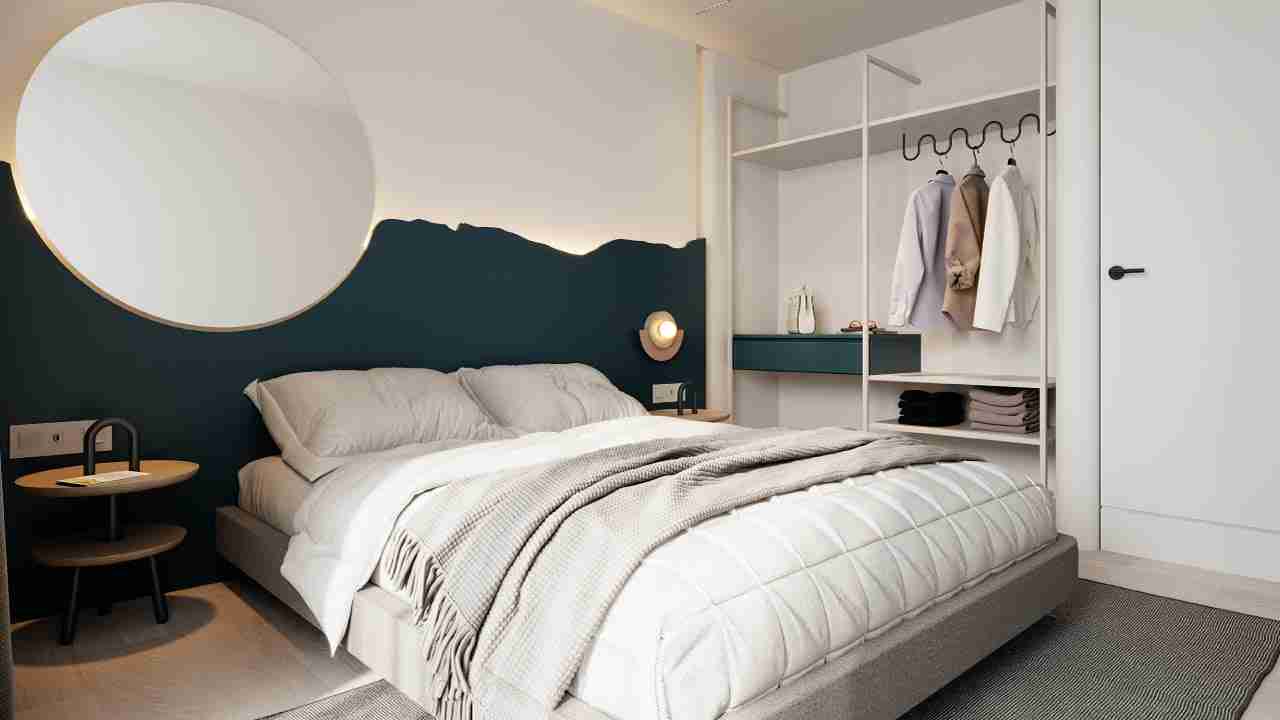 Furnished bedroom in a Ventu Homtel suite