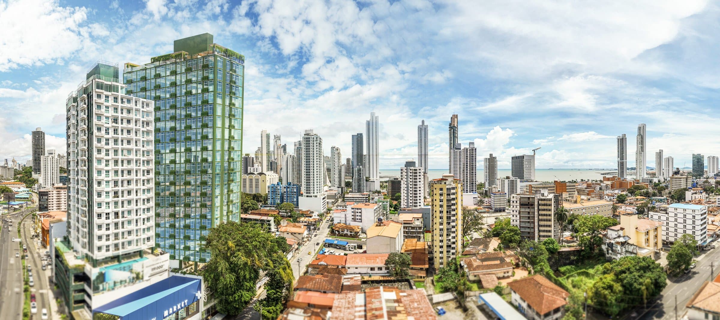 Aerial render of Amazonas over Bella Vista with the Panama City skyline