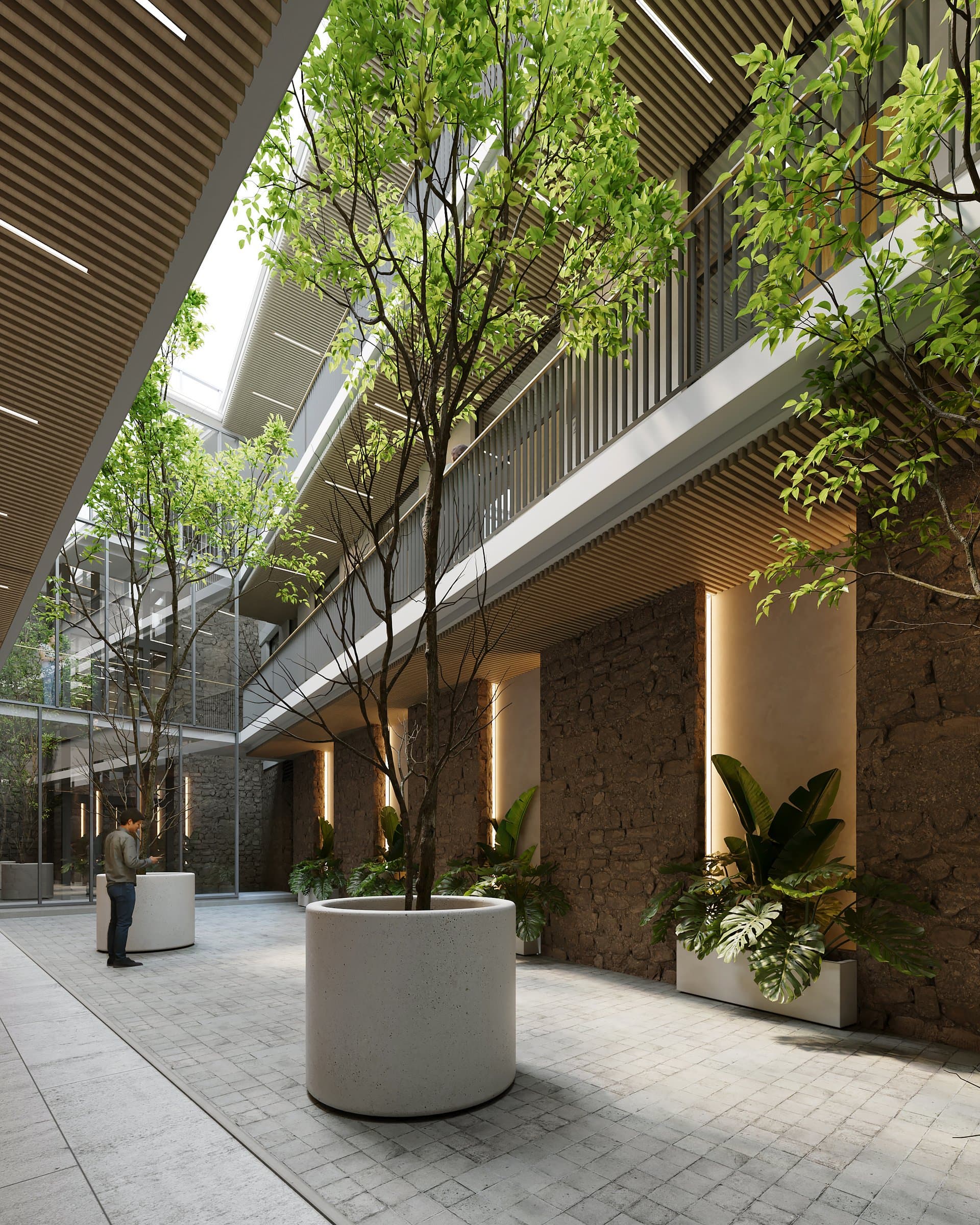 Central courtyard with trees and open walkways at Antigua Casa López, Casco Antiguo