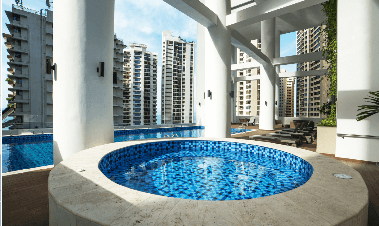 Deluxe Residences round jacuzzi beside the pool