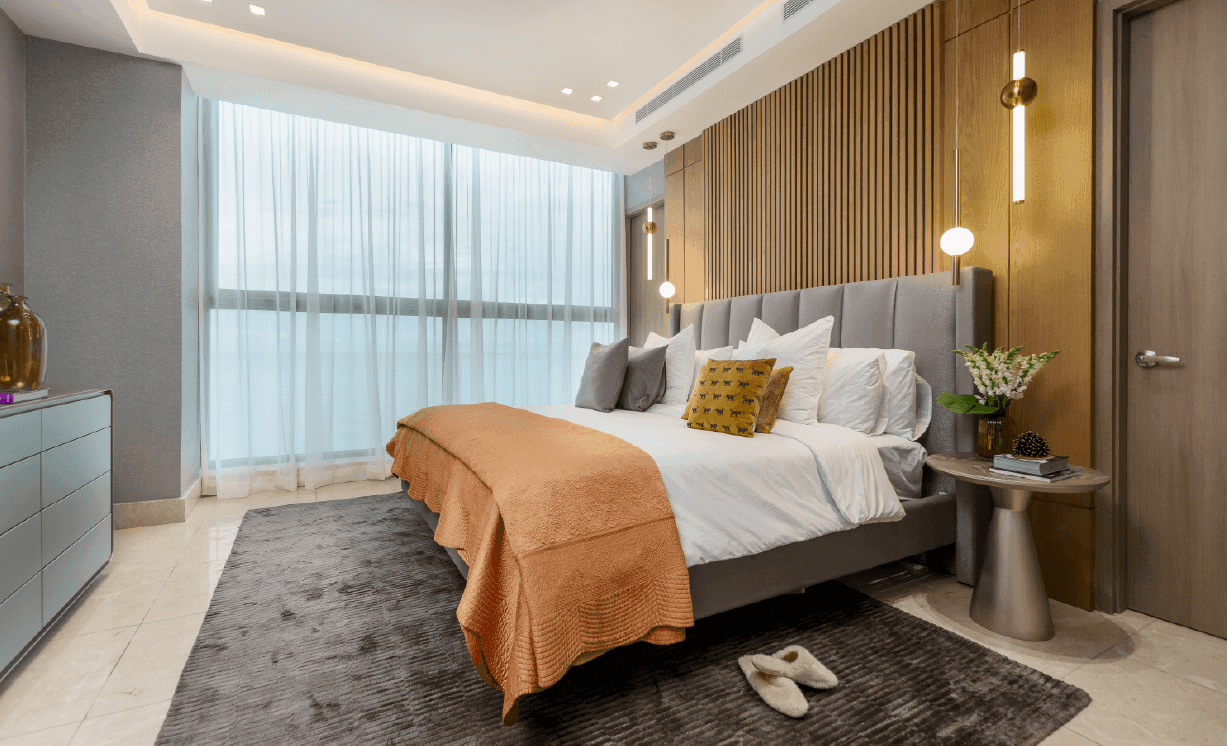 Deluxe Residences bedroom with floor-to-ceiling curtains