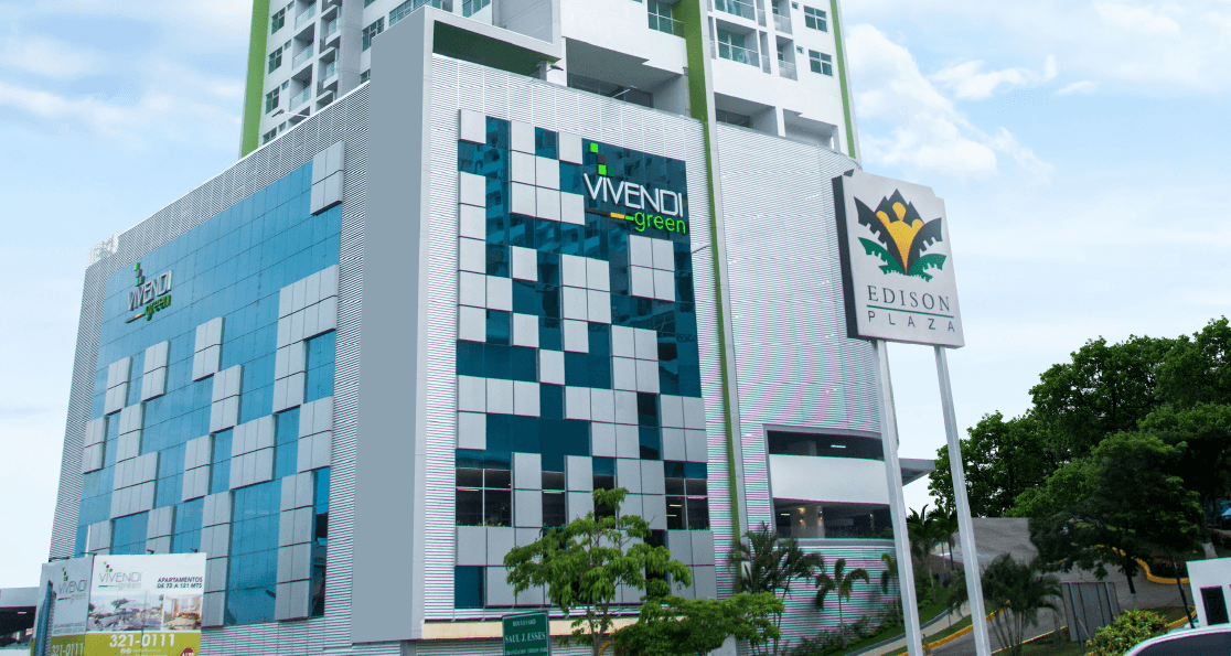 Vivendi Green tower base with a blue and green checkered tile facade and the Edison Park sign