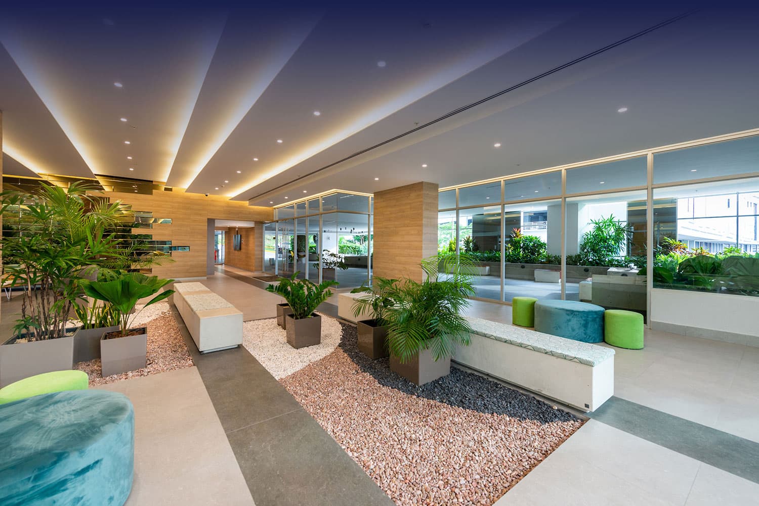 Vivendi Green lobby lounge with planters and seating