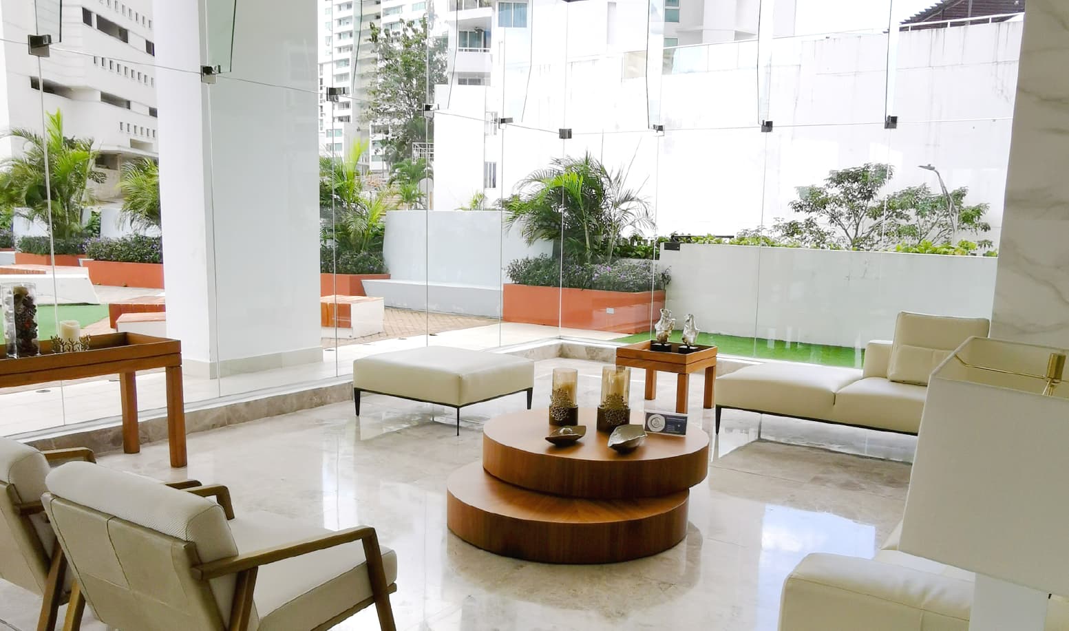 Pacific Park lobby lounge opening onto a garden terrace