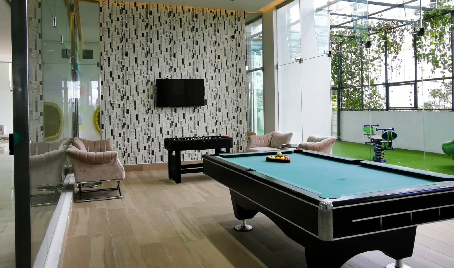Pacific Park game room with pool table