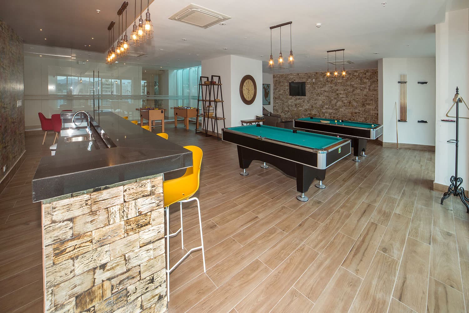 Elite 500 game room with bar and pool tables