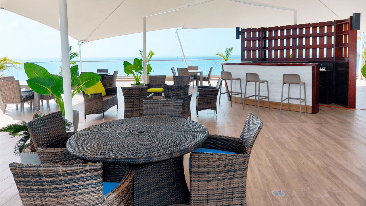 Ocean Waves beach bar terrace with ocean views