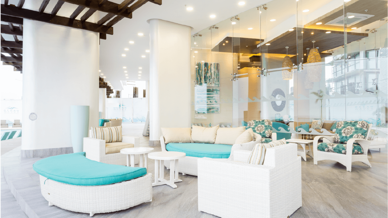 Ocean Waves lobby lounge with white and turquoise furniture